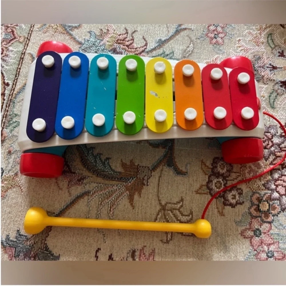 Fisher-price pull toy, xylophone musical instrument with mallet rolling